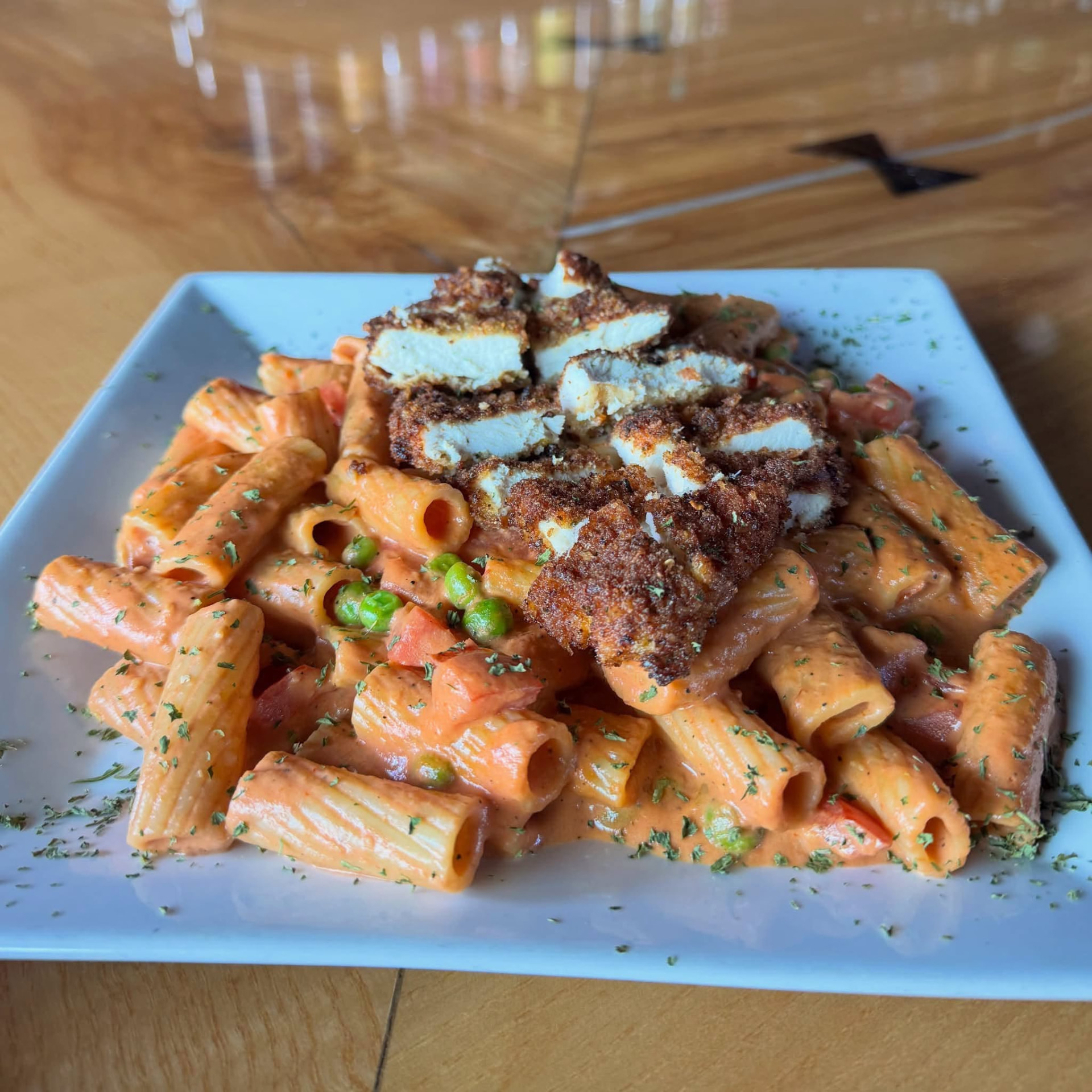 Ziti with chicken cutlet in creamy vodka sauce